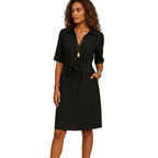 woman wearing elegant midi dress with comfortable fit shown in full front view outfit