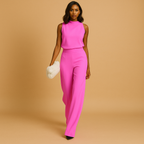 close up of high waist detail on jumpsuit showing structured fit and smooth fabric finish