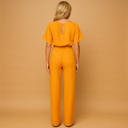 close up of lace up detail on front of jumpsuit showing design and fit