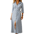 woman wearing long summer dress with loose fit and short sleeves shown in full front view outfit