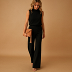 close up of mid waist fit on jumpsuit showing structured silhouette