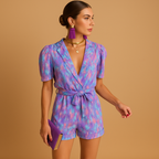 back view of short jumpsuit showing clean structure and short length silhouette